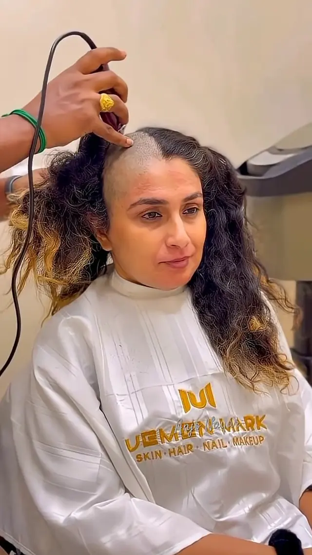 A Salon Head Shave Marks a New Beginning haircut story cover